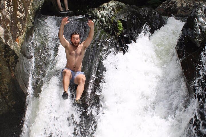 Small-Group El Yunque Waterslide Adventure & transportation