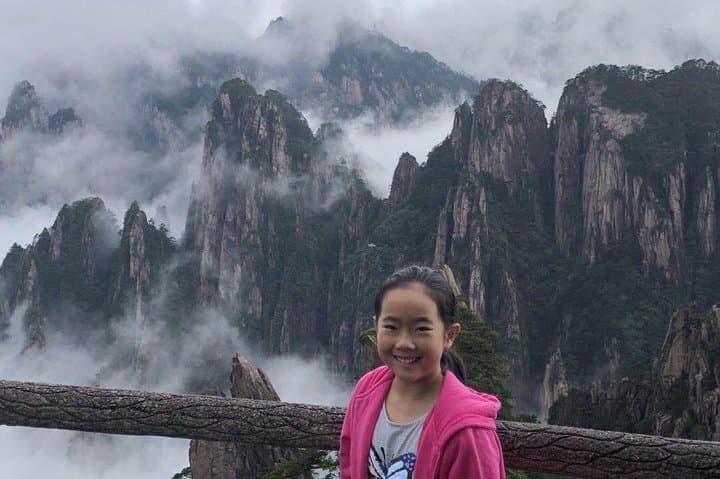 סיור פרטי של יום אחד הכולל את פסגת הוונגשן וכפר הונגצ'ון